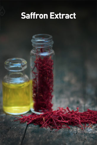 Two glass bottles with saffron extract and saffron threads on a dark surface.