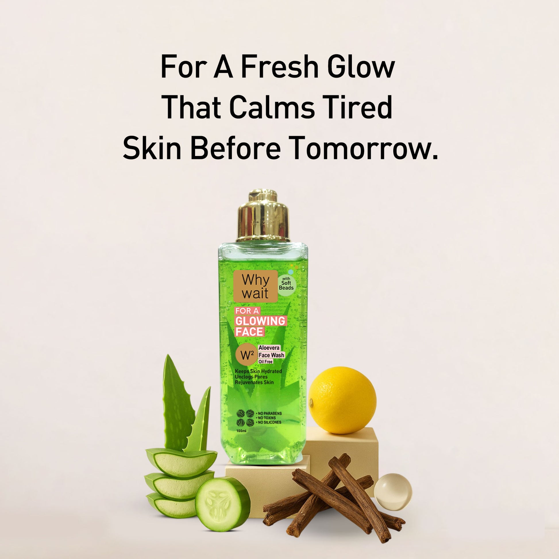 Skincare product with aloe vera, lemon, and cucumber on a light background